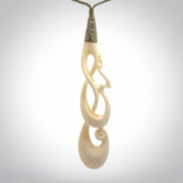 A wonderful, intricate pendant handcarved by Yuri in bone. A beautifully sensual and fascinating form that reflects the complexity and wonder of human relationships.